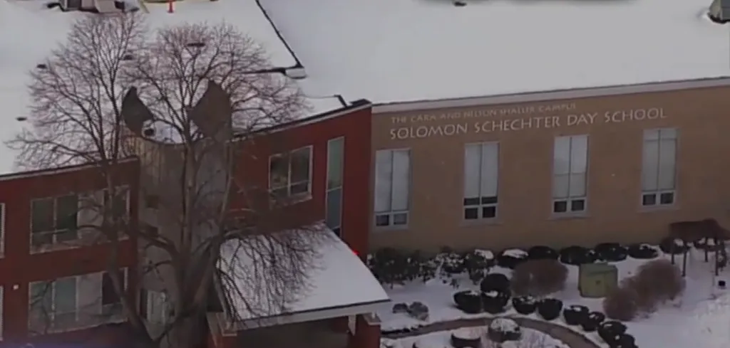 Aerial view of the snow-covered Solomon Schechter Day School.